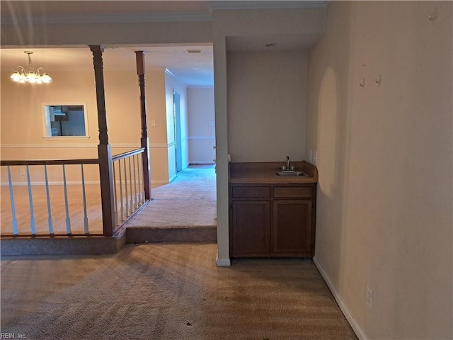 812 Liberal Arts Ct, Virginia Beach, VA 23462 - hallway with carpet, ornamental molding, and a chandelier
