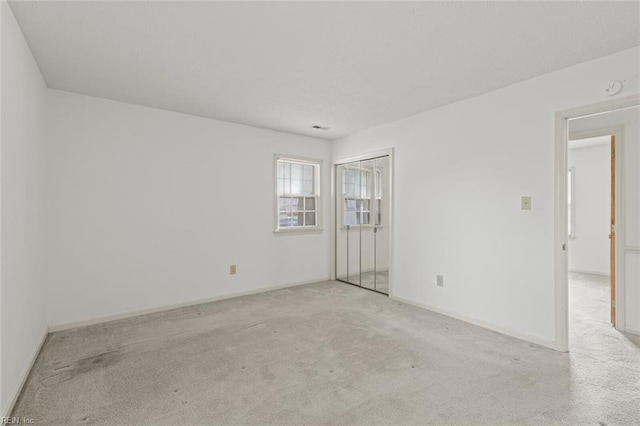 2024 Sarahs Cove Dr, Hayes, VA 23072 - spare room with light carpet and a smoke detector