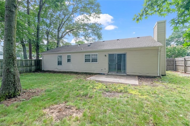 2024 Sarahs Cove Dr, Hayes, VA 23072 - rear view of property featuring a patio, a chimney, and a fenced backyard