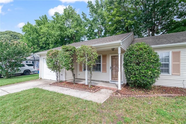 2024 Sarahs Cove Dr, Hayes, VA 23072 - ranch-style house with a garage, concrete driveway, a front yard, and a porch