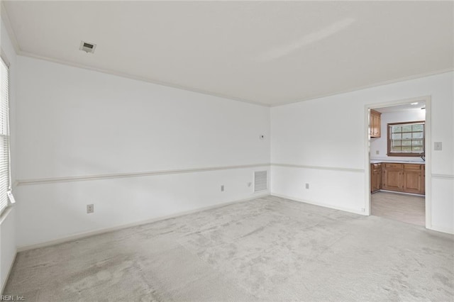 2024 Sarahs Cove Dr, Hayes, VA 23072 - unfurnished room with light carpet and baseboards