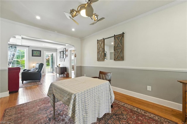 139 Chancellor Rd, Hampton, VA 23661 - dining room with arched walkways, ceiling fan, crown molding, wood finished floors, and recessed lighting