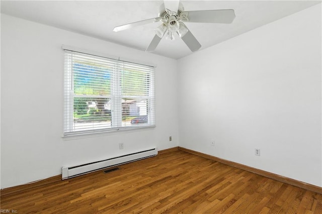 10 Watts Dr, Hampton, VA 23666 - empty room with baseboard heating, wood finished floors, and a ceiling fan