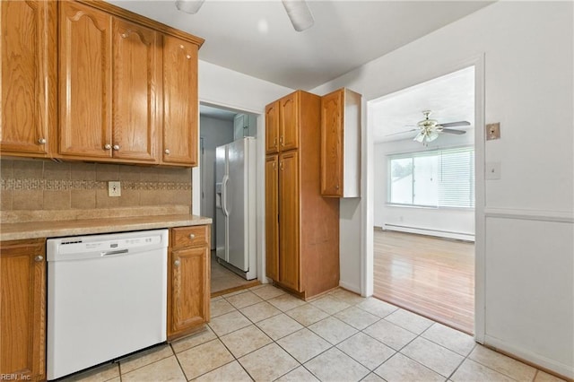 10 Watts Dr, Hampton, VA 23666 - kitchen with white appliances, baseboard heating, a ceiling fan, light countertops, and decorative backsplash