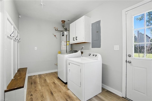 1245 Bells Mill Rd, Chesapeake, VA 23322 - washroom featuring water heater, cabinet space, washer and dryer, electric panel, and light wood-style flooring
