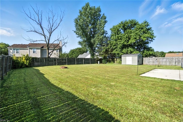 1245 Bells Mill Rd, Chesapeake, VA 23322 - fenced backyard featuring a patio area and a storage unit