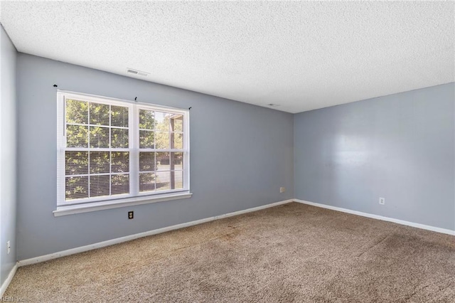 5012 Thatcher Way, Virginia Beach, VA 23456 - carpeted spare room with a textured ceiling and baseboards