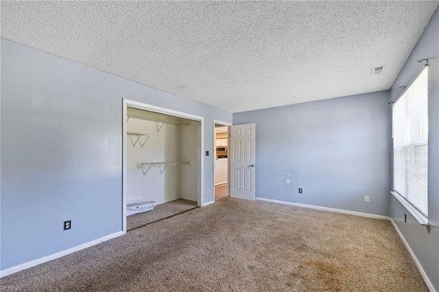 5012 Thatcher Way, Virginia Beach, VA 23456 - unfurnished bedroom with carpet, a textured ceiling, and a closet