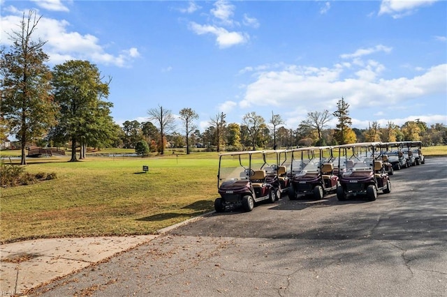 5012 Thatcher Way, Virginia Beach, VA 23456 - view of community featuring a yard, uncovered parking, and view of wooded area