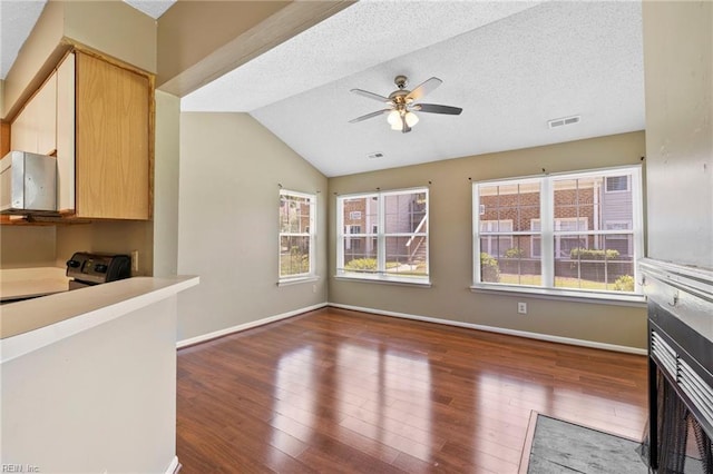 5012 Thatcher Way, Virginia Beach, VA 23456 - unfurnished living room with wood finished floors, ceiling fan, a textured ceiling, and lofted ceiling