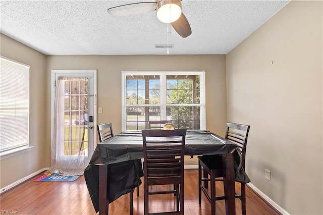 5012 Thatcher Way, Virginia Beach, VA 23456 - dining space with a textured ceiling, wood finished floors, and a ceiling fan
