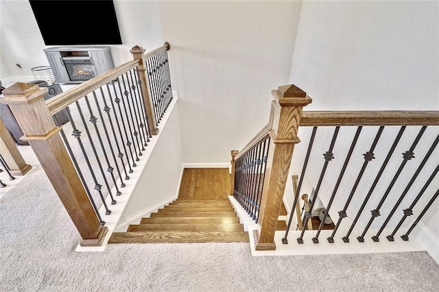 113 Saint Andrews, Smithfield, VA 23430 - stairs with carpet floors, wood finished floors, and a glass covered fireplace