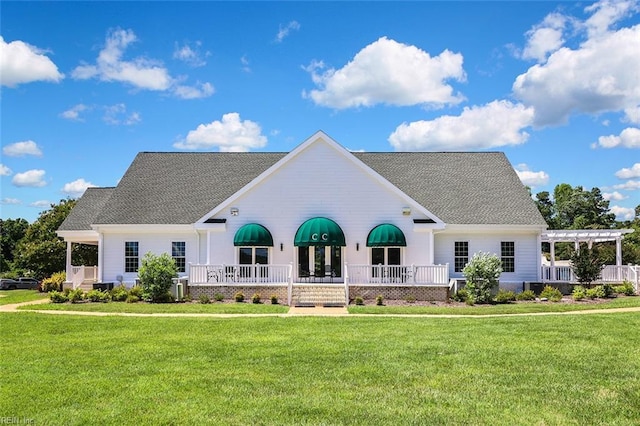 113 Saint Andrews, Smithfield, VA 23430 - back of property featuring a lawn and roof with shingles