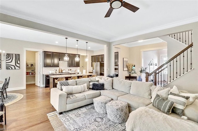 113 Saint Andrews, Smithfield, VA 23430 - living area with ceiling fan, light wood-style floors, ornamental molding, stairs, and recessed lighting