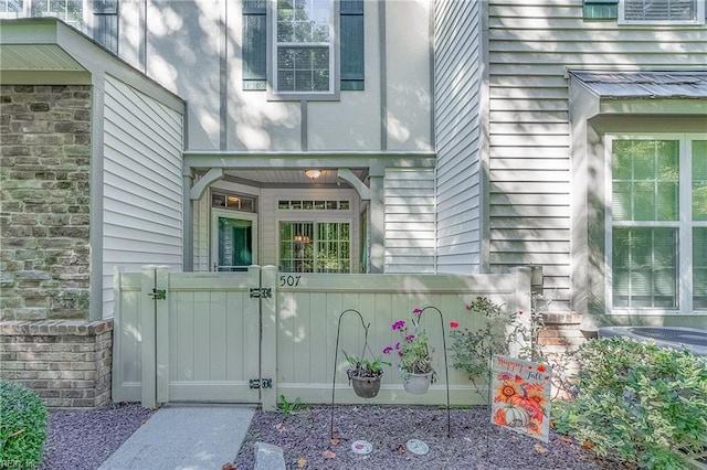 507 Marsh Hawk Trl, Carrollton, VA 23314 - doorway to property with a gate