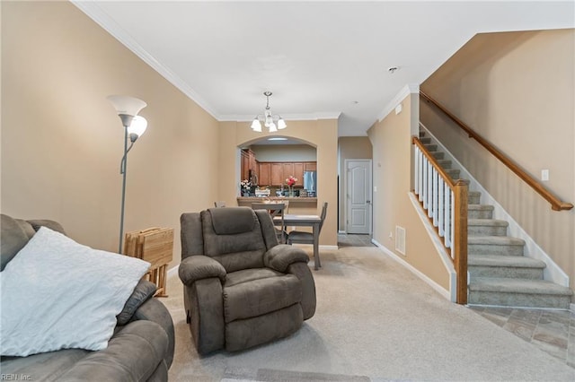 507 Marsh Hawk Trl, Carrollton, VA 23314 - living room featuring arched walkways, light carpet, a chandelier, stairs, and ornamental molding
