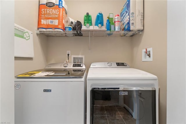 507 Marsh Hawk Trl, Carrollton, VA 23314 - washroom featuring independent washer and dryer and dark tile patterned floors