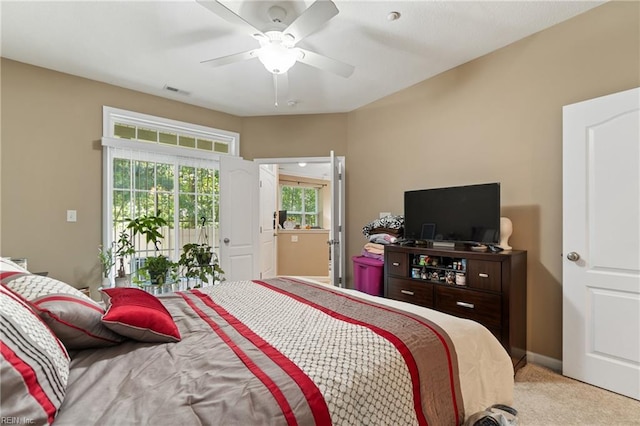 507 Marsh Hawk Trl, Carrollton, VA 23314 - bedroom with access to outside, light colored carpet, and ceiling fan