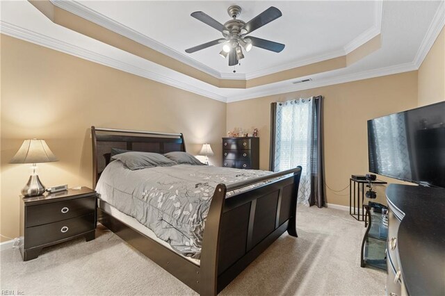 507 Marsh Hawk Trl, Carrollton, VA 23314 - bedroom featuring a tray ceiling, light colored carpet, crown molding, and a ceiling fan