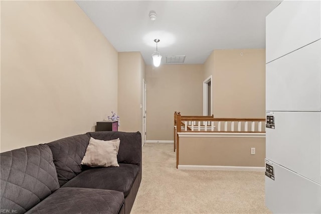 507 Marsh Hawk Trl, Carrollton, VA 23314 - living room with light colored carpet and baseboards