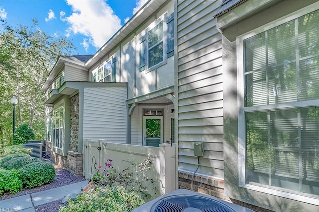 507 Marsh Hawk Trl, Carrollton, VA 23314 - view of exterior entry featuring stone siding