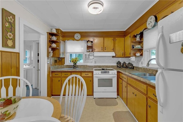 8579 Farys Mill Rd, Gloucester, VA 23061 - kitchen with open shelves, white appliances, under cabinet range hood, ornamental molding, and brown cabinetry