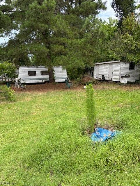 1993 Mark Pine Rd, Hayes, VA 23072 - view of green lawn with a storage shed