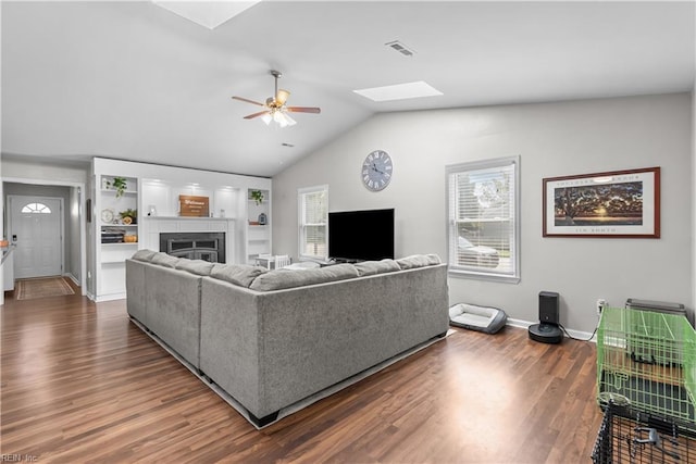 4052 Peridot Dr, Virginia Beach, VA 23456 - living room with a skylight, ceiling fan, wood finished floors, plenty of natural light, and vaulted ceiling