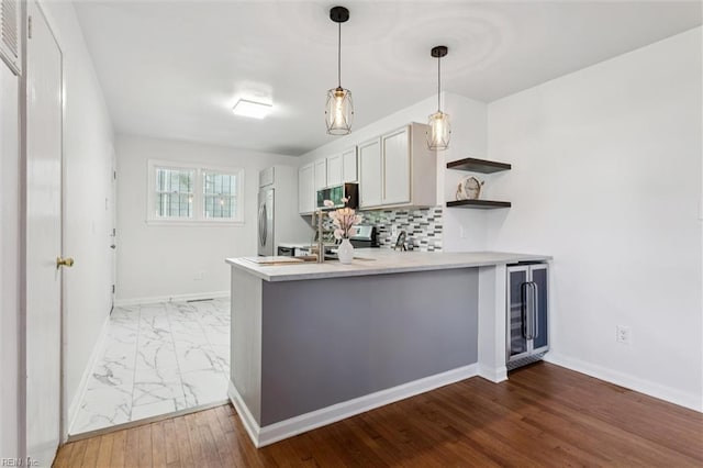 2734 Jamestown Ave, Hampton, VA 23661 - kitchen featuring wine cooler, a peninsula, light countertops, open shelves, and stainless steel fridge