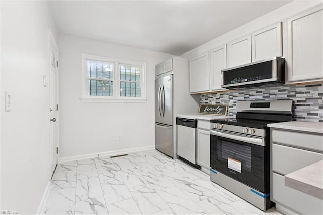 2734 Jamestown Ave, Hampton, VA 23661 - kitchen with stainless steel appliances, light marble finish floors, light countertops, and tasteful backsplash