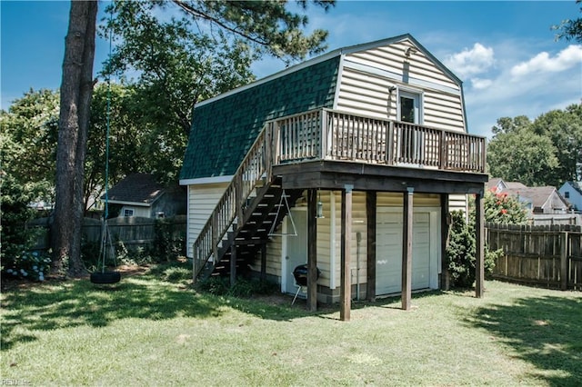 3728 Sidley Rd, Chesapeake, VA 23321 - rear view of house featuring a fenced backyard, a wooden deck, stairs, and a gambrel roof