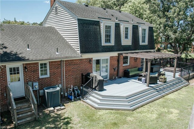 3728 Sidley Rd, Chesapeake, VA 23321 - back of house featuring roof with shingles, an outdoor hangout area, a wooden deck, brick siding, and a chimney