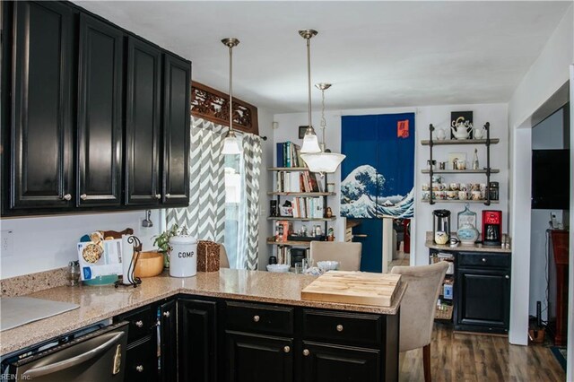 3728 Sidley Rd, Chesapeake, VA 23321 - kitchen featuring dark cabinetry, stainless steel dishwasher, a peninsula, dark wood-style floors, and decorative light fixtures