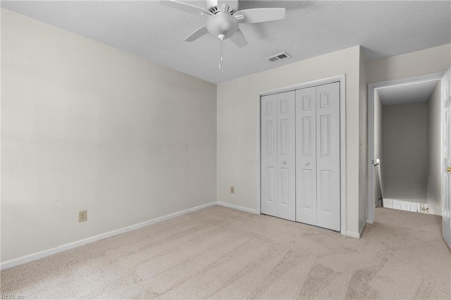1444 Debbs Ln, Chesapeake, VA 23320 - unfurnished bedroom featuring carpet, a closet, a textured ceiling, and ceiling fan