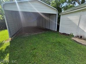 1697 Old Ferry Rd, Hudgins, VA 23076 - garage with a carport