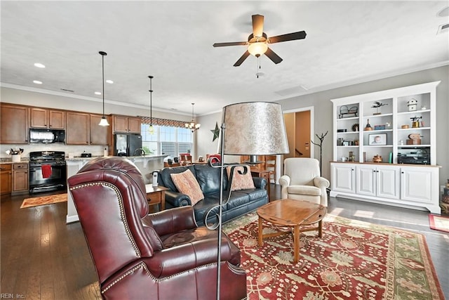 3209 Dodd Dr, Chesapeake, VA 23323 - living area featuring crown molding, a ceiling fan, dark wood-type flooring, recessed lighting, and a chandelier