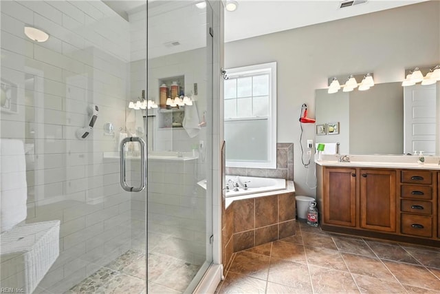 3209 Dodd Dr, Chesapeake, VA 23323 - bathroom with a garden tub, vanity, a shower stall, and tile patterned floors