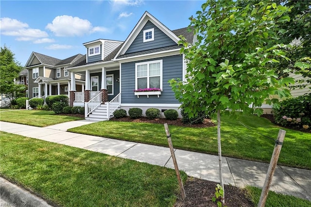 3209 Dodd Dr, Chesapeake, VA 23323 - view of front facade featuring covered porch and a front yard
