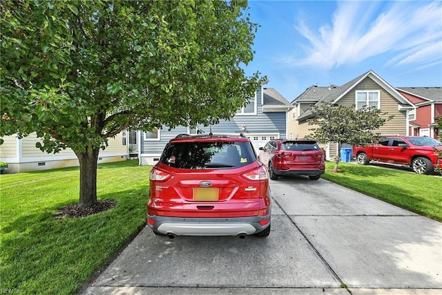 3209 Dodd Dr, Chesapeake, VA 23323 - view of property hidden behind natural elements featuring a front lawn and concrete driveway