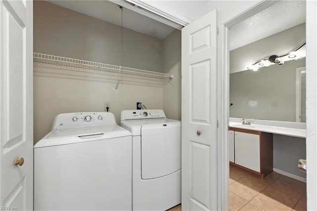 182 Old Bridge Rd, Newport News, VA 23608 - laundry room featuring independent washer and dryer and light tile patterned flooring