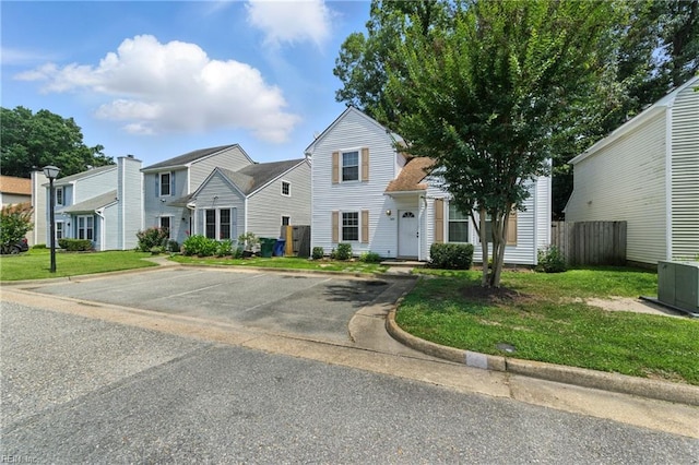 182 Old Bridge Rd, Newport News, VA 23608 - view of front of house featuring uncovered parking and a residential view