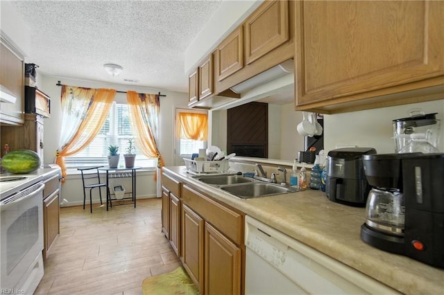 5523 Keydet Dr, Virginia Beach, VA 23462 - kitchen featuring white electric stove, light countertops, a textured ceiling, brown cabinets, and light wood-style floors
