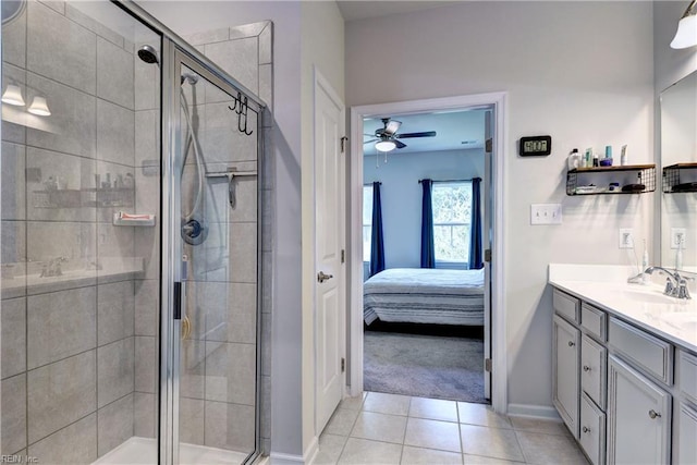 3419 Foxglove Dr, Toano, VA 23168 - ensuite bathroom featuring vanity, a shower stall, ceiling fan, and tile patterned floors