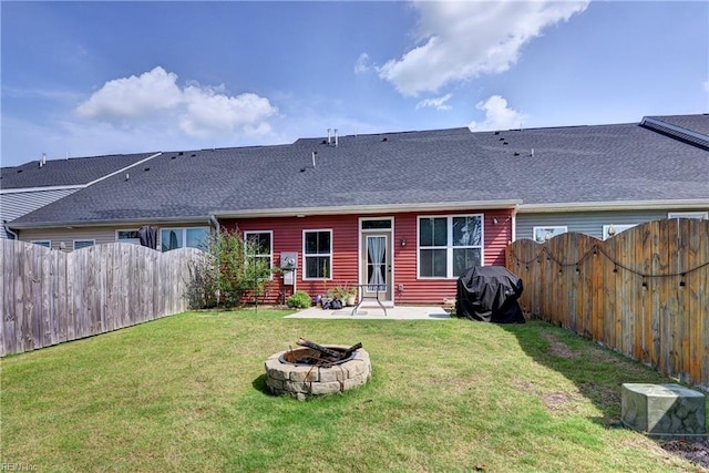 3419 Foxglove Dr, Toano, VA 23168 - rear view of house with a fire pit, a fenced backyard, a patio area, and a shingled roof
