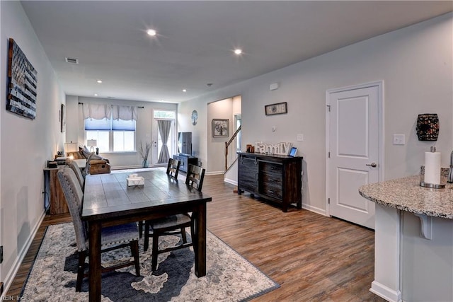 3419 Foxglove Dr, Toano, VA 23168 - dining space featuring wood finished floors, recessed lighting, and stairs