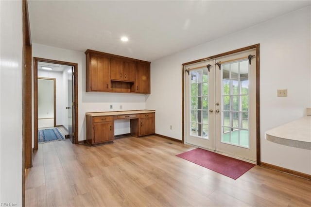 112 Farmington Blvd, Hampton, VA 23666 - kitchen featuring light wood finished floors, french doors, brown cabinets, recessed lighting, and light countertops
