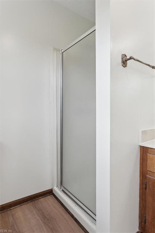 112 Farmington Blvd, Hampton, VA 23666 - full bathroom featuring a stall shower, vanity, and wood finished floors
