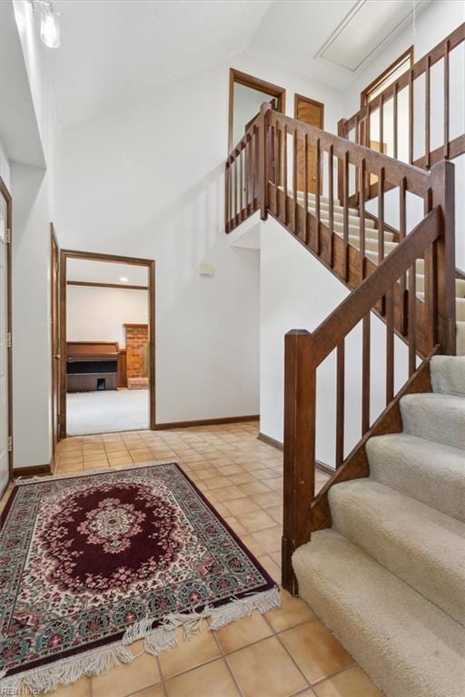 112 Farmington Blvd, Hampton, VA 23666 - stairs with high vaulted ceiling and tile patterned floors