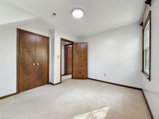 112 Farmington Blvd, Hampton, VA 23666 - unfurnished bedroom with light carpet and a closet