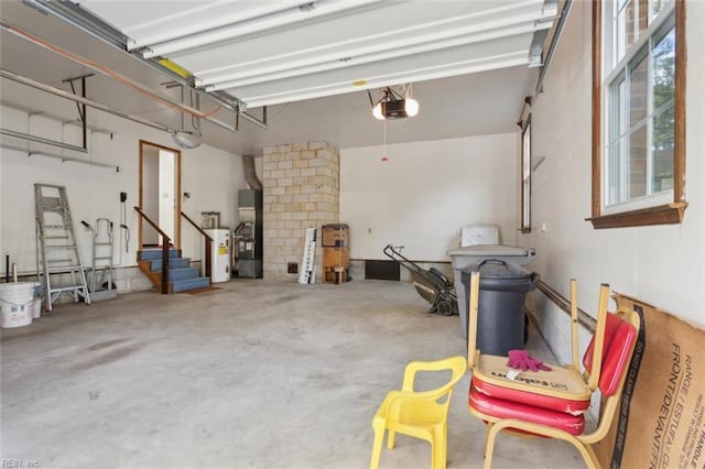 112 Farmington Blvd, Hampton, VA 23666 - garage featuring a garage door opener and water heater